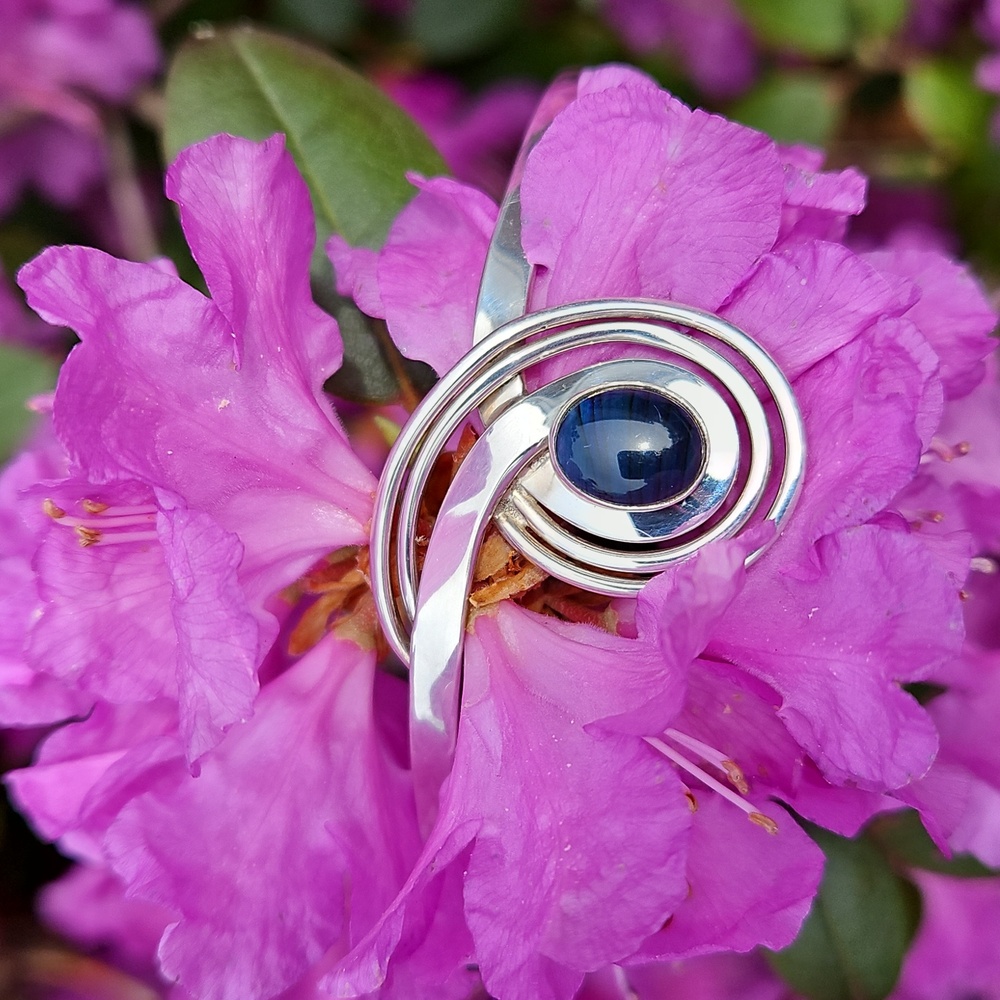 Elegant Silver and Dark Blue Swirl Bracelet